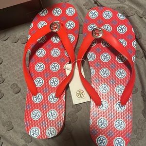 Brand new TB flip flops